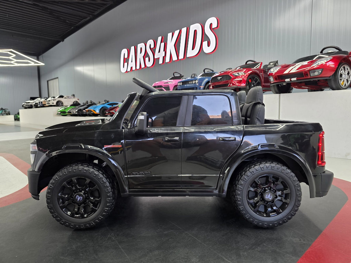 Additional view of the black 12V Dodge RAM-inspired kids electric ride-on car