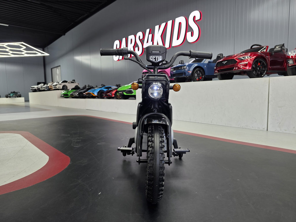 Additional view of the black 12V Honda Cross Cub 110-inspired kids electric motorcycle