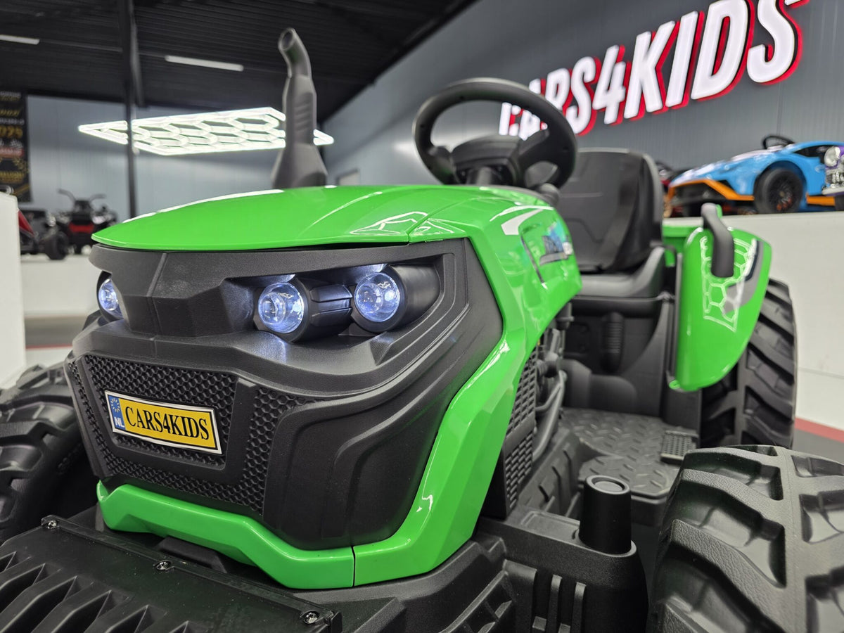 Additional view of the green 24V kids electric tractor with trailer