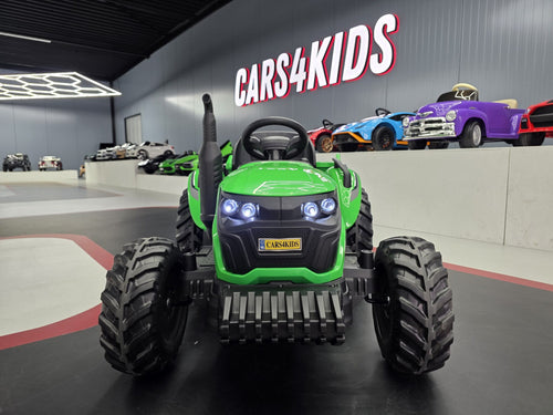 Additional view of the green 24V kids electric tractor with trailer