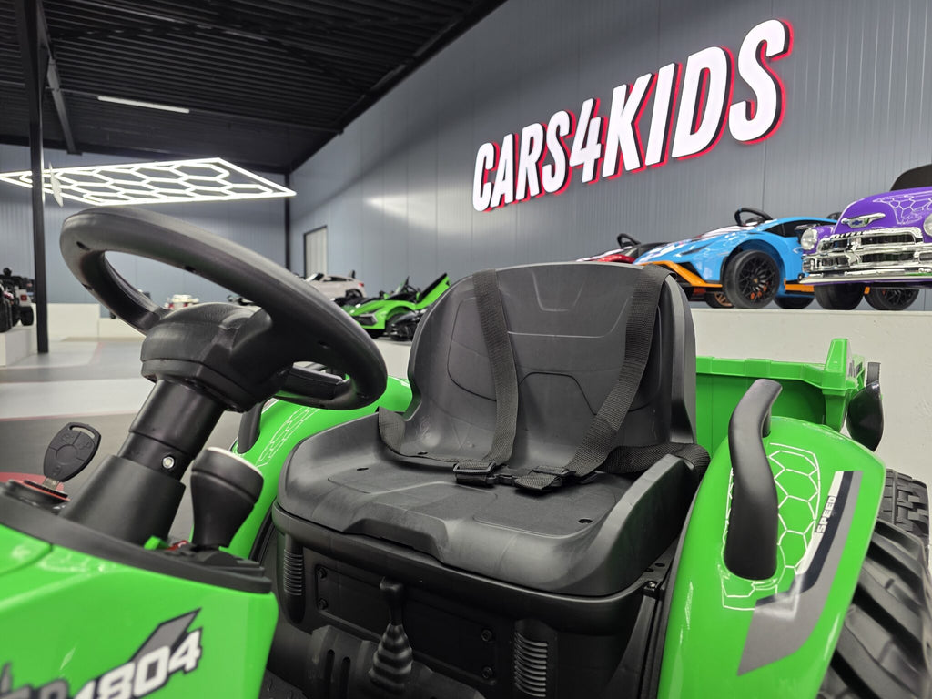 Additional view of the green 24V kids electric tractor with trailer
