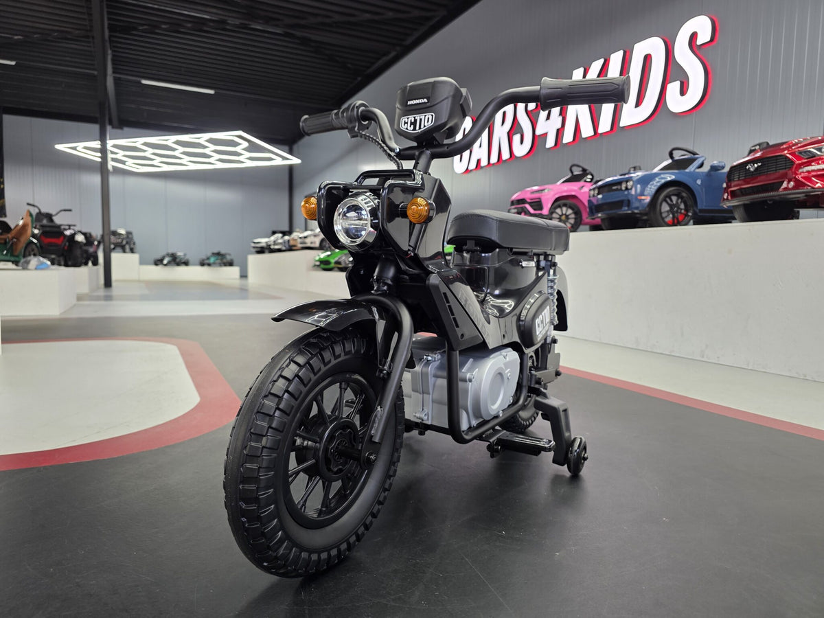 Black 12V Honda Cross Cub 110-inspired kids electric motorcycle