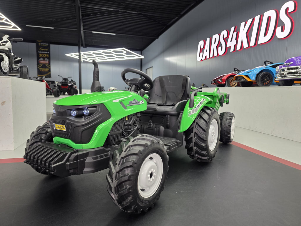 Green 24V kids electric tractor with trailer